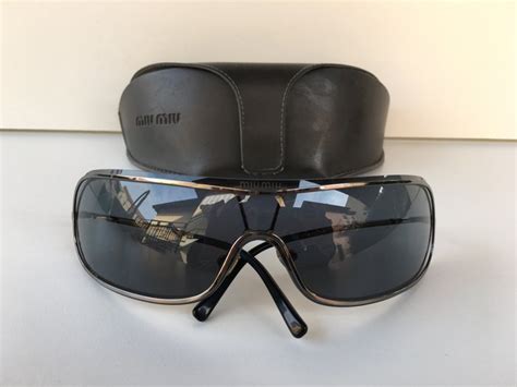 miu miu sunglasses men|miu sunglasses price.